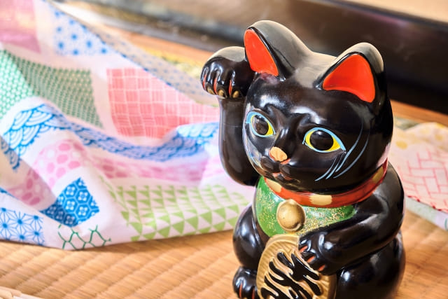 Manekineko: The history of Japan's beckoning lucky cat.