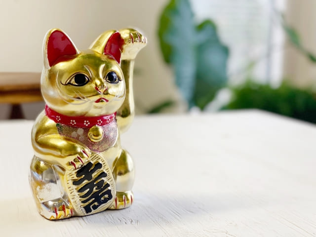 Manekineko: The history of Japan's beckoning lucky cat.