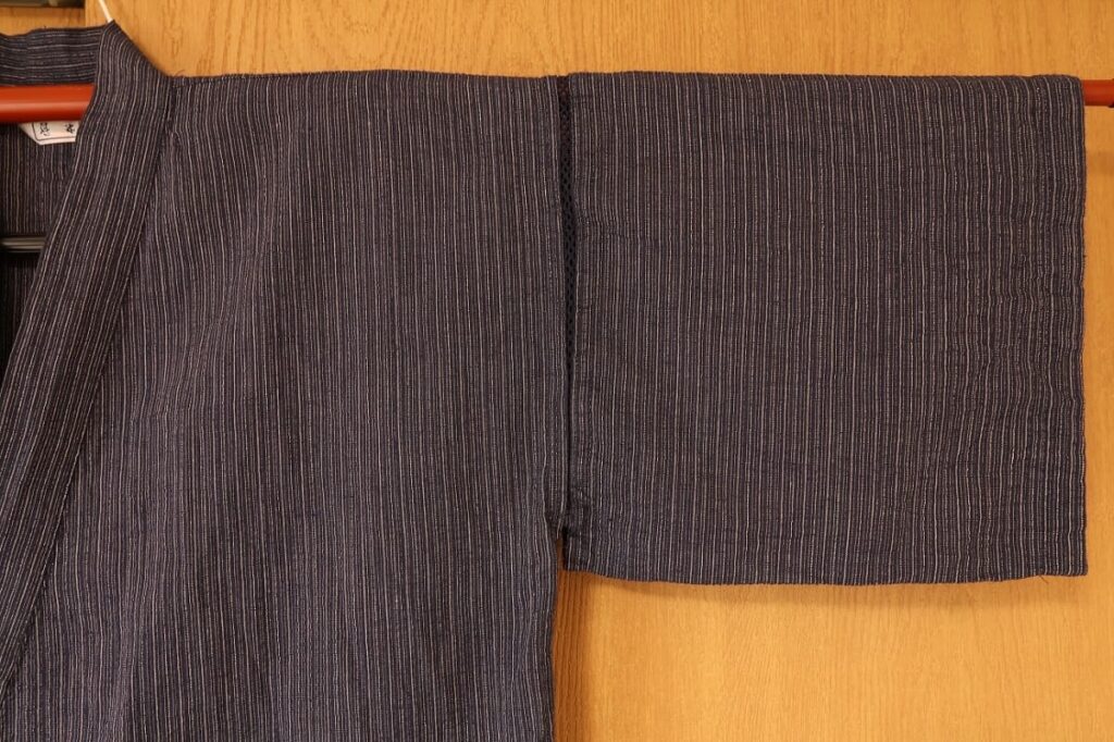 Close-up of the sleeve of a Japanese jinbei showing the lightweight seersucker cotton-linen fabric