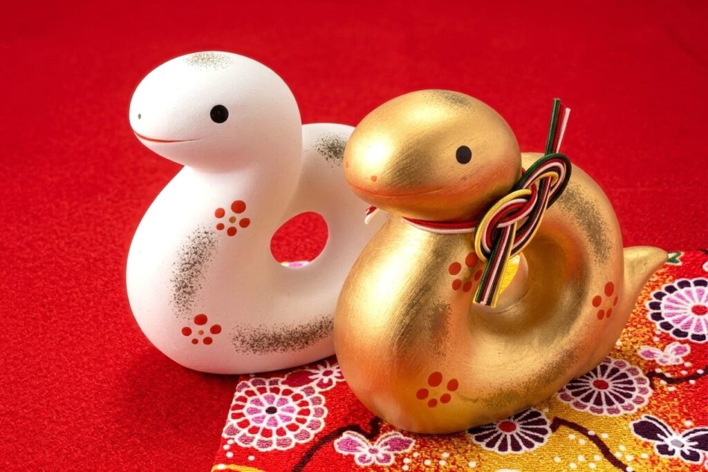 White snake symbolizing wealth and good fortune in Japan