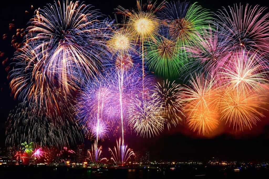 Fireworks lighting up the night sky during an evening event in Japan
